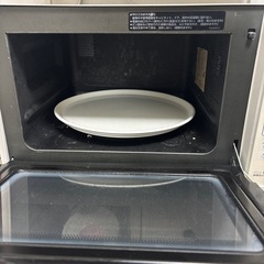 壊れた電子レンジの画像