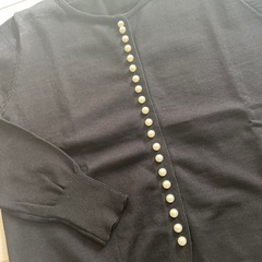 ニットトップスLの画像