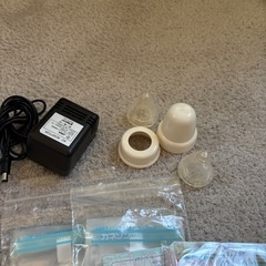 ピジョン電動搾乳機、母乳瓶と母乳パックの画像