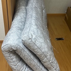 布団と敷布団のセットの画像