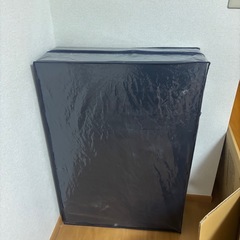 布団と敷布団のセットの画像