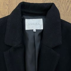 黒色ロングコートの画像