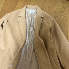 ロングコートベージュの画像