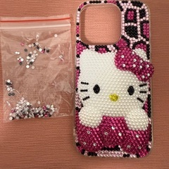 iPhone16proケース ハローキティデコ電200円の画像