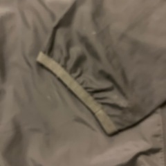 Reebok グレー ウィンドブレーカーの画像