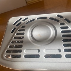 ニッセイ（NiSSei）製の反射式石油ストーブの画像