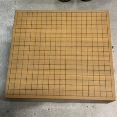 囲碁台と碁石の画像