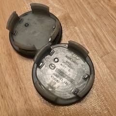 Mazda 純正 ホイールキャップ 黒　4個セットの画像