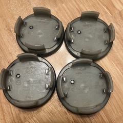 Mazda 純正 ホイールキャップ 黒　4個セットの画像