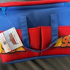 【新品ﾀｸﾞ付き】カーズ大きなﾎﾟｹｯﾄ付きﾊﾞｽｹｯﾄの画像