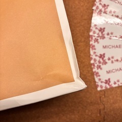 【値段交渉可能】マイケルコース　シール&紙袋&鞄袋（少しダメージあり）の画像
