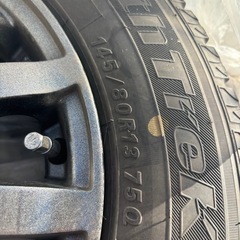 スタッドレスタイヤ付きアルミホイールの画像