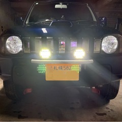 ジムニー フォグランプ ナンバーガード イカリングの画像