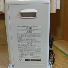 ホワイトのファンヒーターの画像