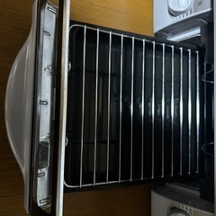 話し合い中ガスコンロの画像