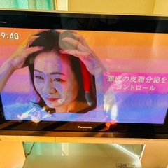 テレビ（パナソニック）➕専用台➕純正リモコンの画像