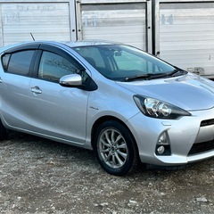 H.24(2012)年 トヨタ アクア 1.5 G バックカメラ、低燃費、ハイブリット シルバーメタリック 走行115,800kmの画像