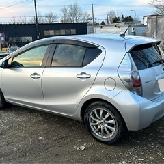 H.24(2012)年 トヨタ アクア 1.5 G バックカメラ、低燃費、ハイブリット シルバーメタリック 走行115,800kmの画像