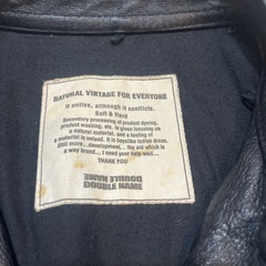 ダブルネームのレザーブルゾンの画像