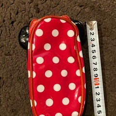 ディズニーストア　ミニーマウス ポーチ 赤い水玉の画像