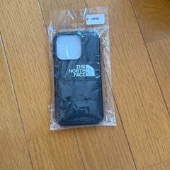 THENORTHFACEiPhone14pro用ケースダウンジャケット風の画像