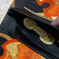 本場西陣織 袋帯 引き箔にオレンジ系 未使用メガネ証紙つきの画像