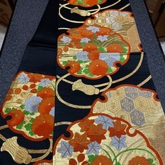 本場西陣織 袋帯 引き箔にオレンジ系 未使用メガネ証紙つきの画像