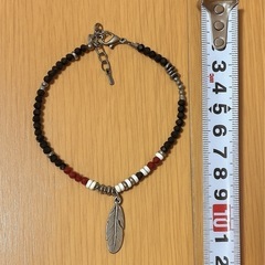 羽根チャーム付きビーズアンクレットの画像