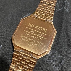 NIXON ROBOT-ROCK THE RE-RUN ゴールド　　　ジャンクの画像