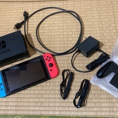 ニンテンドースイッチ本体、プロコン、イヤホンの画像