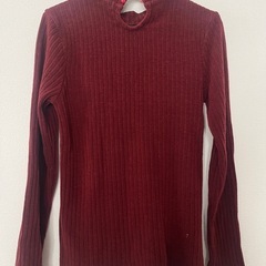 ボルドー セーター ニットの画像