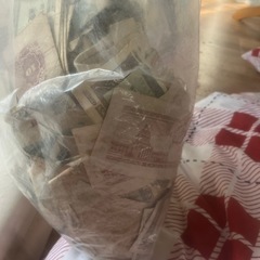 沖縄県内限定訳あり古紙幣１枚25円の画像