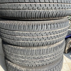 15インチ スチールホイール＋タイヤ4本／175/65R15／トヨタ純正ホイールキャップ付の画像