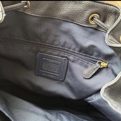 COACH 本革バックパックの画像