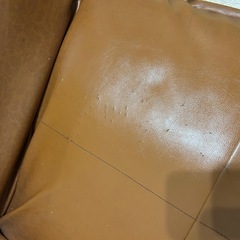 オレンジブラウンソファーの画像