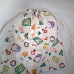 【ハンドメイド】クリスマス柄きんちゃく（ベージュ）の画像