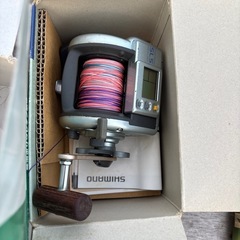 釣り竿とリールの画像