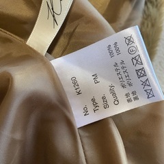 パールボタンペプラムファーベスト の画像