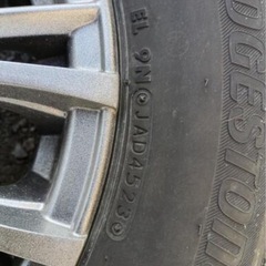 195\65r15 91Qスタッドレスタイヤbridgestone 45週23年製とホイール4本セットの画像