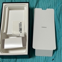 GALAXYs20の空箱とスマホカバーの画像