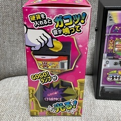 ジャグラー 貯金箱の画像