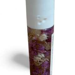 ディズニーストア購入はラプンツェル リップグロス 紫色のフラワー入り ☆ 新品の画像