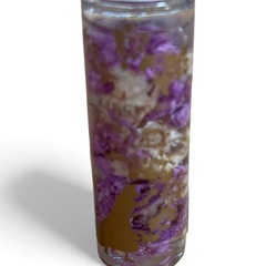 ディズニーストア購入はラプンツェル リップグロス 紫色のフラワー入り ☆ 新品の画像