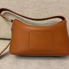 ミラオーウォン　オーバルモチーフホーボーバッグの画像