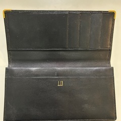 ダンヒルdunhill札入れ ロングウォレット フラップ式二つ折り長財布 二つ折り財布 折財布 さいふ サイフ 小銭入れ無ブラック黒色系デザイン 無地ロゴ レザー横幅　約18センチ 高さ　約9センチ マチ　約1センチスペイン製 メンズmen’s男性用、紳士の画像
