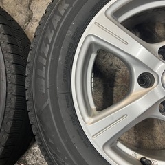 195/65r15スタッドレスタイヤbridgestoneとホイール4本の画像