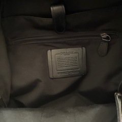 COACHシグネチャーリュック【中古】の画像