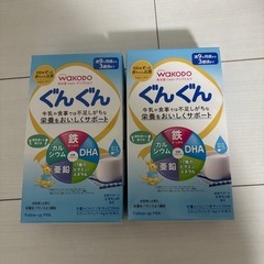 粉ミルク缶とスティックの画像