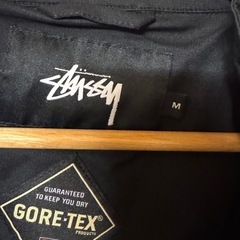 Stussy GORE-TEX ブラックロングジャケットの画像
