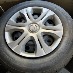日産純正 14インチ スチールホイール & ホイールキャップ付 タイヤ4本セット (185/70R14)の画像